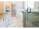 Bathroom with white tub, and luxurious walk-in shower with glass doors at 54 Summer Dr, Walterboro, SC 29488