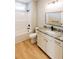 Clean bathroom features white cabinets, quartz countertops, and a shower-tub combo at 54 Summer Dr, Walterboro, SC 29488