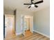Bedroom featuring a ceiling fan and walk-in closet at 54 Summer Dr, Walterboro, SC 29488
