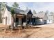 Beautiful single-story home featuring brick and siding, mature trees, and a well manicured yard at 54 Summer Dr, Walterboro, SC 29488