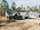 Beautiful single-story home with manicured lawn and attractive exterior, showcasing modern design and curb appeal at 54 Summer Dr, Walterboro, SC 29488