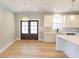 Bright eat-in kitchen features stainless appliances, an island, and french doors at 54 Summer Dr, Walterboro, SC 29488