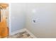 Well-lit laundry room with tile flooring and laundry hook ups at 54 Summer Dr, Walterboro, SC 29488