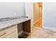Desk area outside of laundry room with granite countertop at 54 Summer Dr, Walterboro, SC 29488