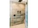 Modern shower featuring a rainfall showerhead, tiled walls, and built-in shower niche at 54 Summer Dr, Walterboro, SC 29488
