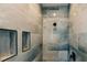 Close-up of modern shower design featuring a built-in niche and rainfall showerhead at 54 Summer Dr, Walterboro, SC 29488