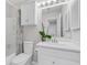 Bathroom featuring neutral cabinets, plant, and shower/tub combo at 58 Indigo Ln, Goose Creek, SC 29445
