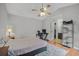 Spacious bedroom with a ceiling fan, hardwood floors, and a neutral color palette at 58 Indigo Ln, Goose Creek, SC 29445