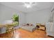 Bright bedroom with hardwood floors, a desk and chair, and a comfortable daybed at 58 Indigo Ln, Goose Creek, SC 29445
