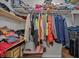 Walk-in closet offering ample storage with clothes and items neatly arranged on shelves and racks at 58 Indigo Ln, Goose Creek, SC 29445