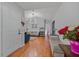 Bright entryway featuring hardwood floors, modern lighting, and fresh decor at 58 Indigo Ln, Goose Creek, SC 29445