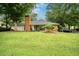 Beautiful single story brick home with a large yard and mature trees at 58 Indigo Ln, Goose Creek, SC 29445