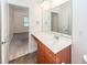 Well-lit bathroom includes a vanity with storage, and views to the hall and the bedroom at 611 Grassy Hill Rd, Summerville, SC 29483