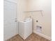 Functional laundry room with tile flooring, washer hookups, and access to the exterior at 611 Grassy Hill Rd, Summerville, SC 29483