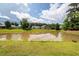 Beautiful pond with stunning water views and grassy perimeter at 611 Grassy Hill Rd, Summerville, SC 29483