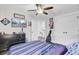 Bedroom with ceiling fan and mounted television for entertainment at 6190 Button Bush Dr, Ravenel, SC 29470