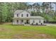 Beautiful two-story home with a covered front porch and well-maintained lawn, exuding curb appeal at 6190 Button Bush Dr, Ravenel, SC 29470