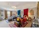 Large bedroom featuring two beds with bright red and blue accents with natural light at 630 Cain Dr, Mount Pleasant, SC 29464