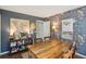 Spacious office space with a large wooden table and nature-themed wallpaper at 630 Cain Dr, Mount Pleasant, SC 29464