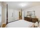 Elegant bedroom with a four-poster bed, hardwood floors, and classic décor, creating a serene retreat at 647 Ellis St, Mount Pleasant, SC 29464