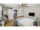 Comfortable bedroom with a cozy bed, stylish furniture, and a glimpse into an adjoining bathroom at 647 Ellis St, Mount Pleasant, SC 29464