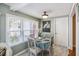 Cozy breakfast nook with a table set for dining, complemented by natural light and serene decor at 647 Ellis St, Mount Pleasant, SC 29464
