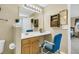 Bathroom with vanity, chair, large mirror and view to bedroom with doorway to walk-in closet at 67 Regency Oaks Dr, Summerville, SC 29485