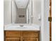 Bathroom features a modern vanity with stylish cabinets and a well-lit mirror over the sink at 67 Regency Oaks Dr, Summerville, SC 29485