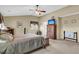 Comfortable bedroom with ceiling fan, large dresser with TV, and ample natural light at 67 Regency Oaks Dr, Summerville, SC 29485