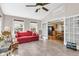 Spacious, tiled living room with vaulted ceilings, lots of natural light and access to the backyard at 67 Regency Oaks Dr, Summerville, SC 29485