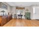 Cozy living room with stylish furniture, hardwood floors, and natural light from a window at 67 Regency Oaks Dr, Summerville, SC 29485