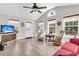 Bright living room with lots of natural light, neutral tones and vaulted ceilings at 67 Regency Oaks Dr, Summerville, SC 29485