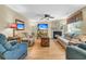 Comfortable living room featuring a fireplace, hardwood floors, and ample seating at 67 Regency Oaks Dr, Summerville, SC 29485