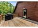 A wooden back deck adjacent to the house at 6840 Early Jersey Rd, Meggett, SC 29449