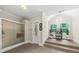 Bright bathroom with tile flooring, glass shower, and natural light from large windows at 6840 Early Jersey Rd, Meggett, SC 29449