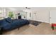 Spacious bedroom with natural light, neutral colors, and a cozy, patterned rug at 6840 Early Jersey Rd, Meggett, SC 29449