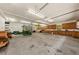 Large garage with wooden cabinets, storage and space for equipment and tools at 6840 Early Jersey Rd, Meggett, SC 29449