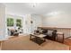 Cozy living room featuring a comfortable seating area, hardwood floors, and natural light at 6840 Early Jersey Rd, Meggett, SC 29449