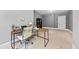 Office space with wooden desk and white chair at 6840 Early Jersey Rd, Meggett, SC 29449