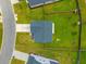 Aerial top-down view of backyard with fresh green grass and wood fence at 716 Mcroy St, Moncks Corner, SC 29461
