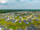 Aerial view of a vibrant residential community with lush, green landscaping at 716 Mcroy St, Moncks Corner, SC 29461