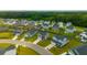 Suburban neighborhood with well-maintained homes surrounded by lush greenery at 716 Mcroy St, Moncks Corner, SC 29461