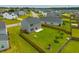 Aerial view of large backyard with wooden fence and small trees in a residential neighborhood at 716 Mcroy St, Moncks Corner, SC 29461