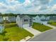 Beautiful two-story home with a large lawn and a two-car garage at 716 Mcroy St, Moncks Corner, SC 29461