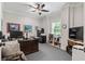 Home office with large desk, neutral carpet, and natural light at 8964 Palmetto Rd, Edisto Island, SC 29438