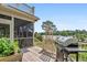 Outdoor grill on back deck with scenic waterfront views at 8964 Palmetto Rd, Edisto Island, SC 29438