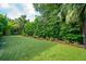 Manicured backyard featuring lush artificial turf, providing a perfect space for recreation and relaxation at 924 Mciver St, Mount Pleasant, SC 29464