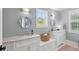 Elegant bathroom with double vanity, marble countertops, and stylish lighting fixtures at 924 Mciver St, Mount Pleasant, SC 29464
