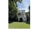 Charming home featuring a white exterior, inviting front porch, and well-maintained landscaping at 924 Mciver St, Mount Pleasant, SC 29464