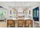 Stylish kitchen featuring a marble island, pendant lighting, and custom cabinetry at 924 Mciver St, Mount Pleasant, SC 29464
